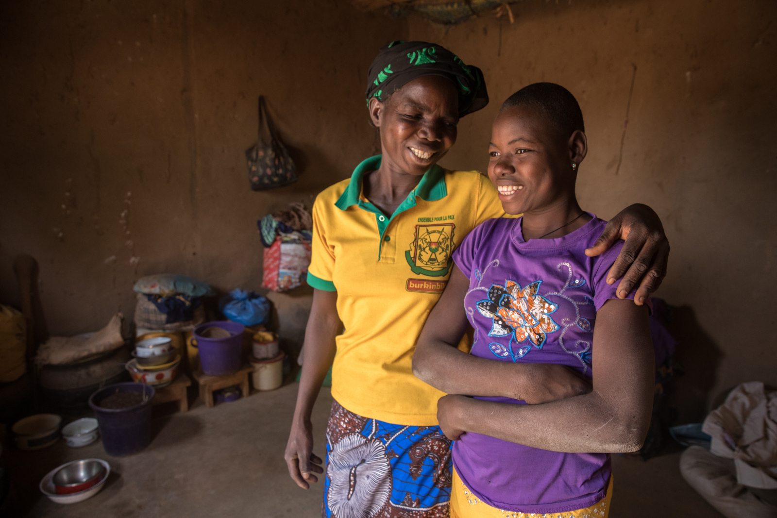 Two people smiling