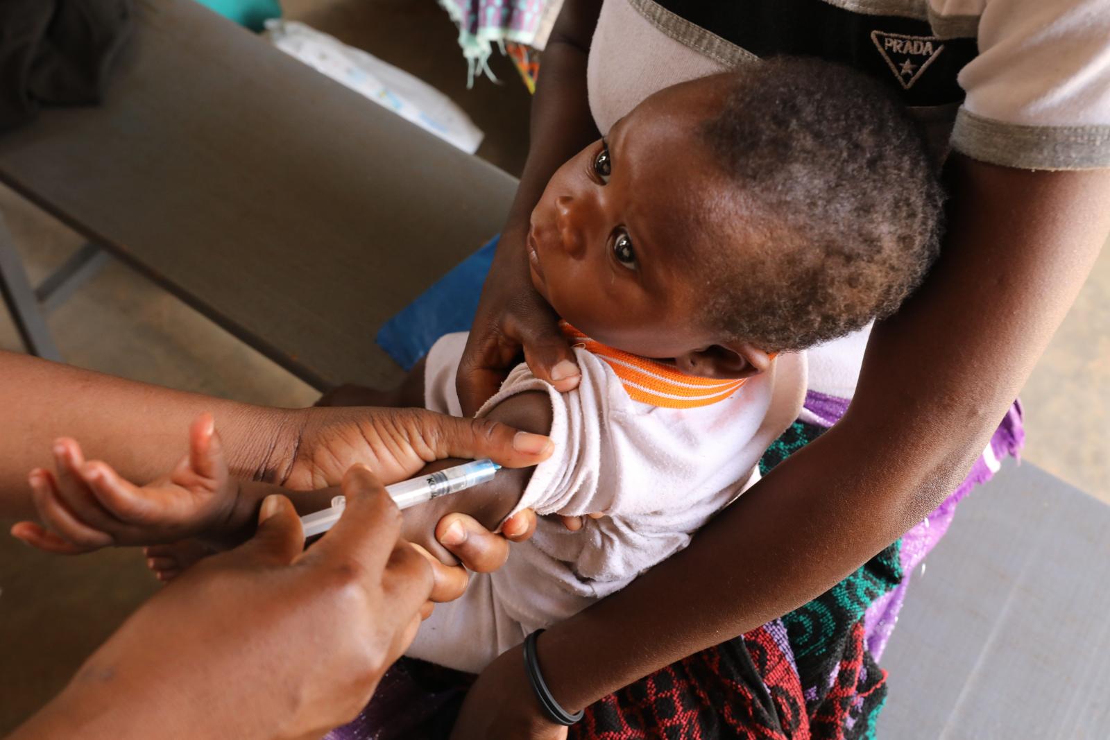 a child receiving a vaccine shot